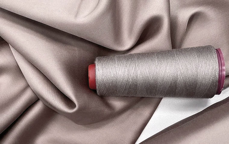 Benang pemintalan yang disesuaikan